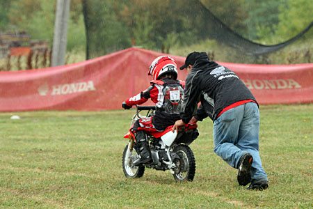 Kids Motocross Training - Instructor Pushing