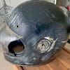 A Bell Bullitt helmet that has been crashed in.