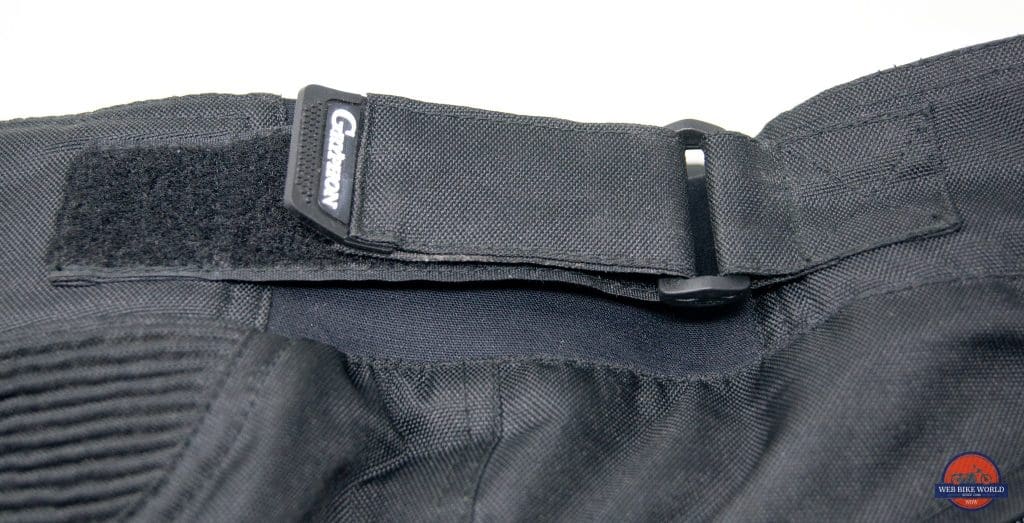 A view of the adjustable velcro at the waist of the Gryphon Moto Indy Pants.