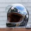 Bell Bullitt Helmet on wooden surface with face shield raised