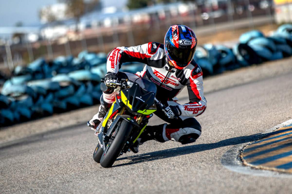 A view of MiniGP riders in the race to win the cup and continue forward in the pursuit toward MotoGP
