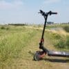 Varla Eagle One scooter on grass path
