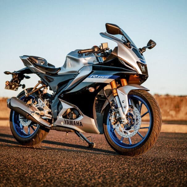 Yamaha's YZF-R15M motorcycle at sunset on a port road in Sydney