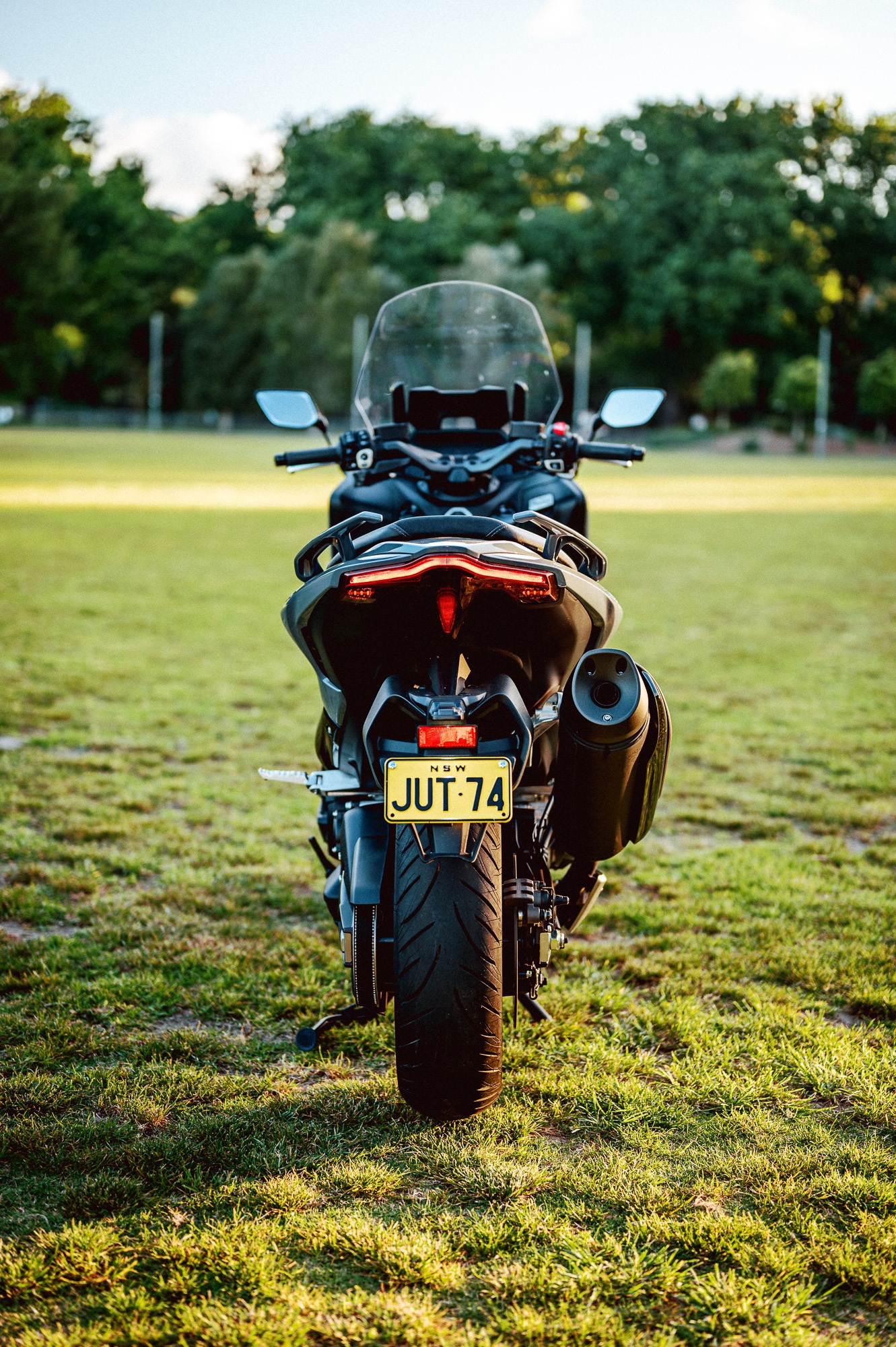 A 2022 Yamaha TMAX Tech MAX Scooter outside at sunset