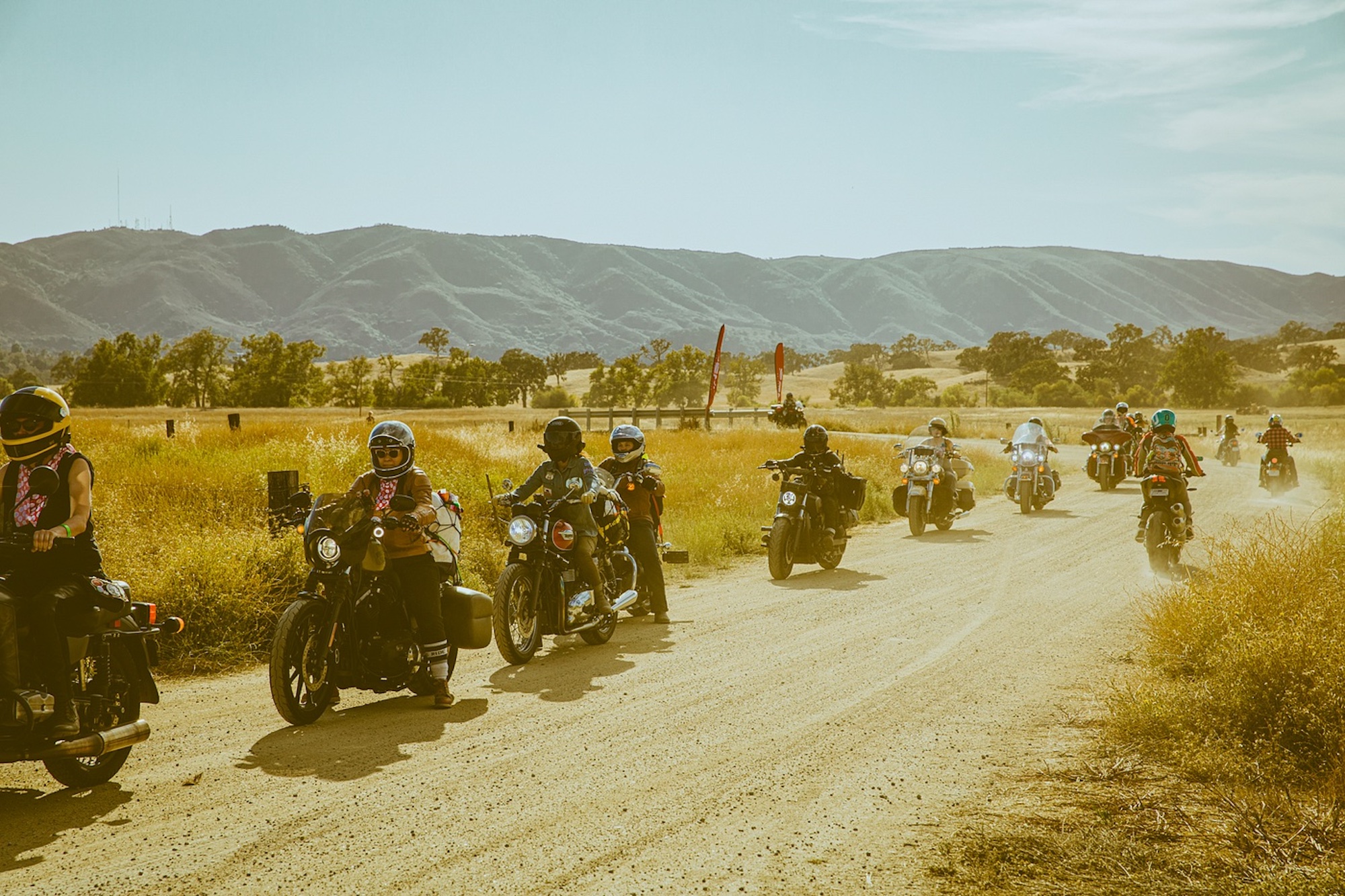 A group of female motorcyclists riding at the Babes Ride On event. Media sourced from The Bold Italic.