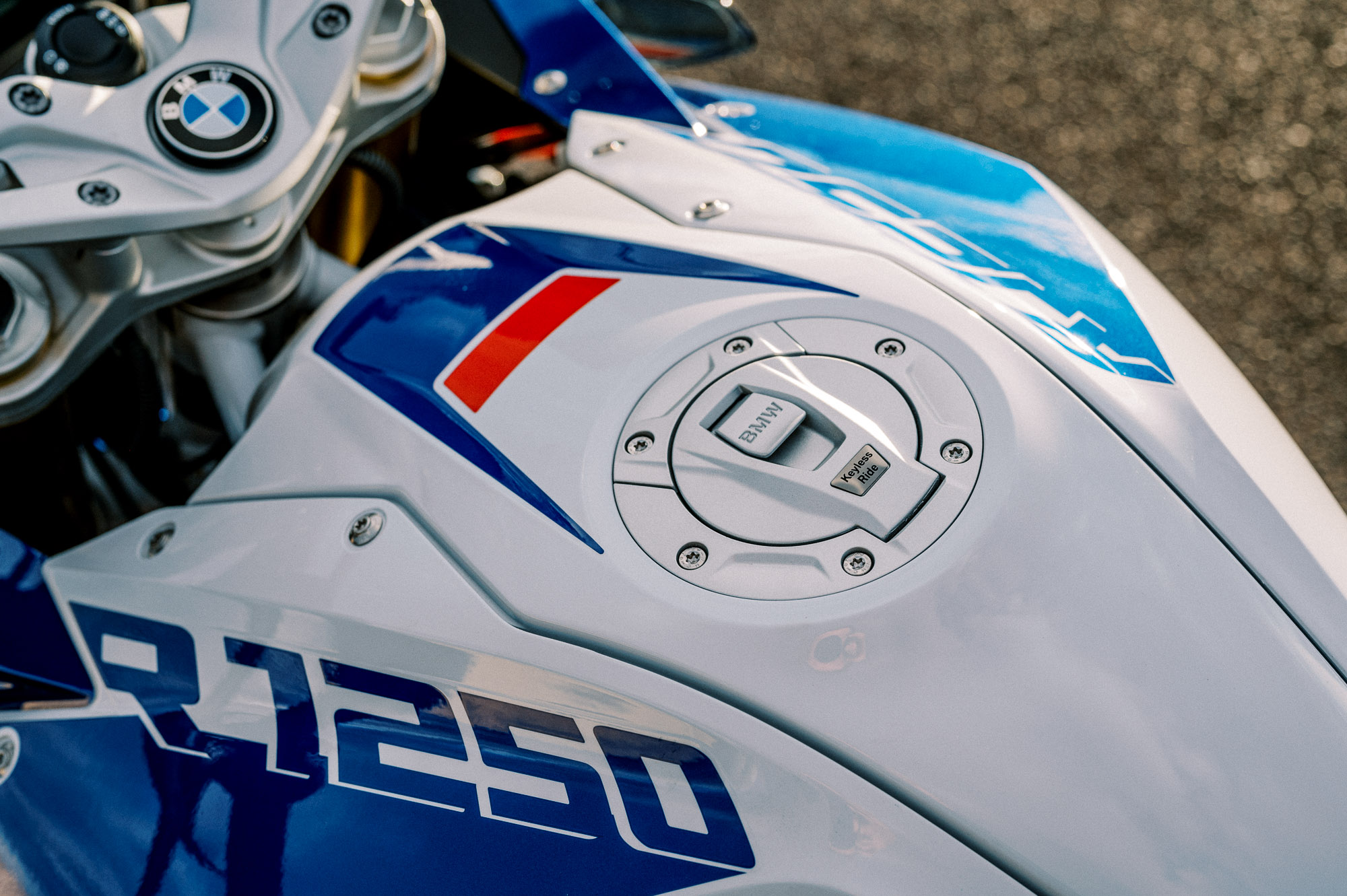 a detail of BMW's 2023 R 1250 RS motorcycle parked at sunset in Sydney