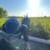 Scorpion Covert FX helmet on the back of a motorcycle