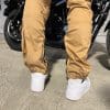 Rear calves of the Khaki ARCANE Armored Cargo Joggers
