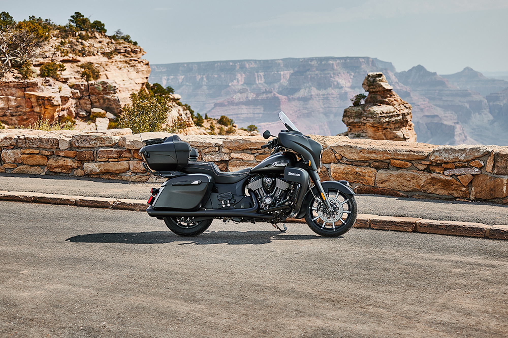Indian's 2024 Roadmaster Dark Horse motorcycle in a canyon.
