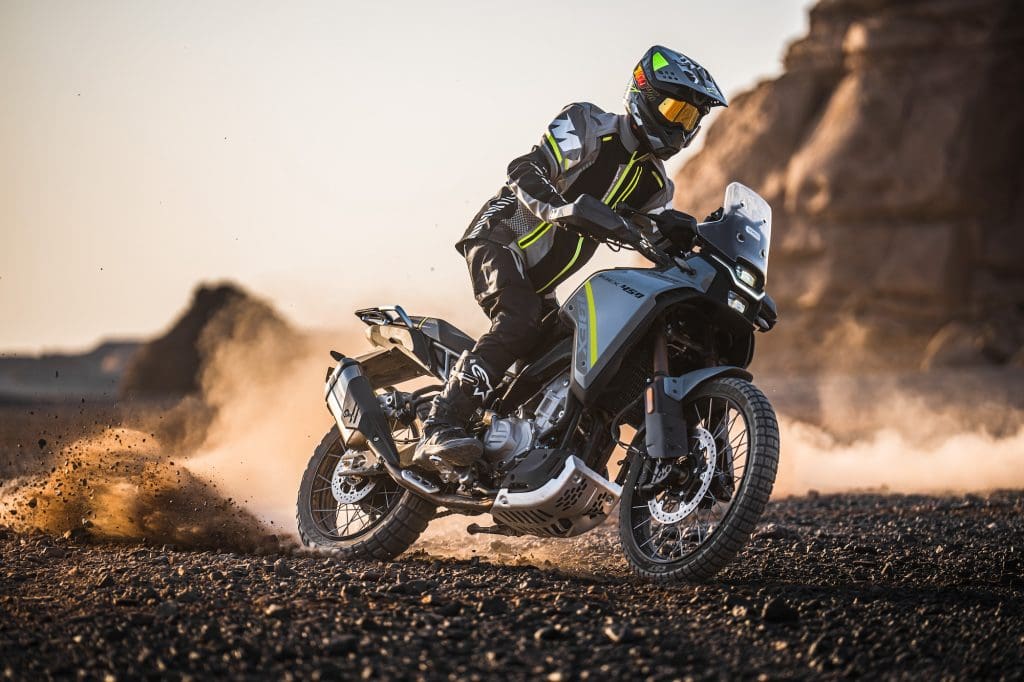 A rider on an adventure motorcycle.