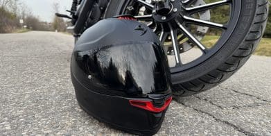 Scorpion EXO-Eclipse resting next to a motorcycle tire